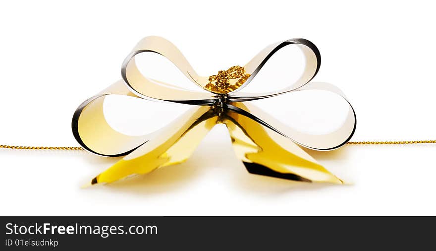 Gold bow isolated on white background