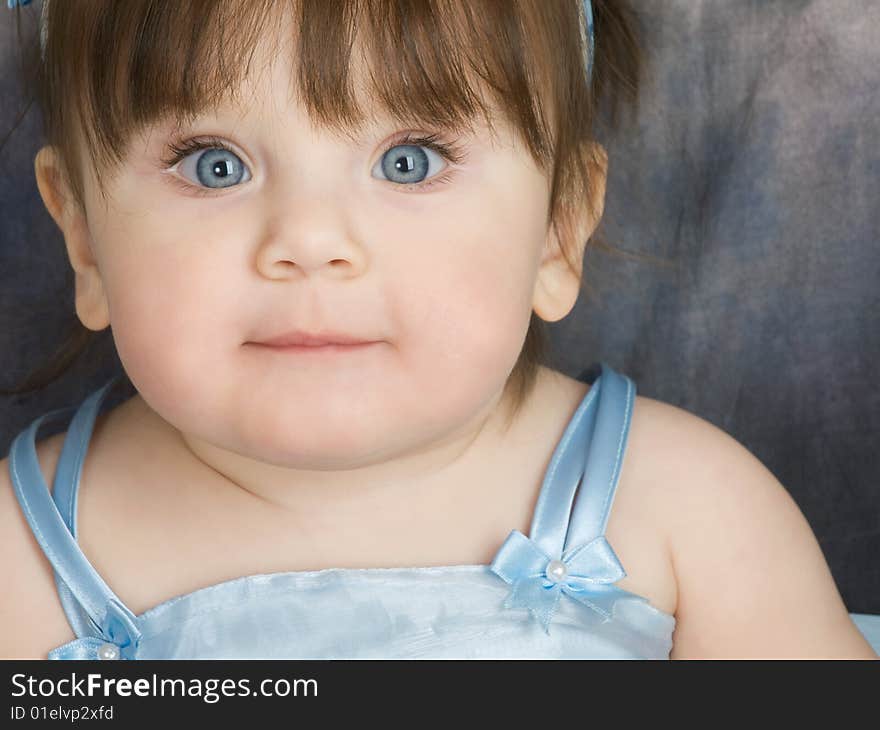 Portrait of blue eyed toddler