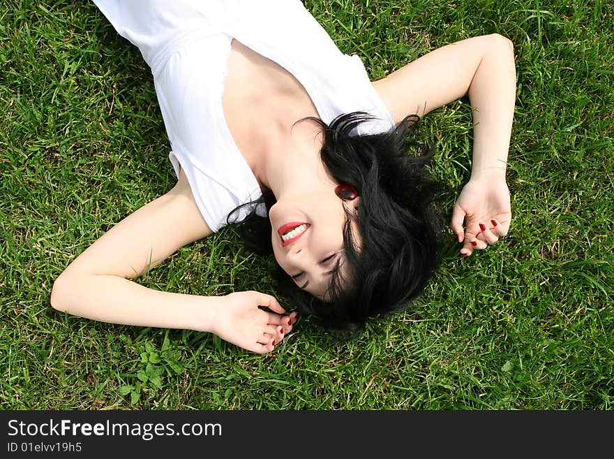 Woman Rest On The Grass