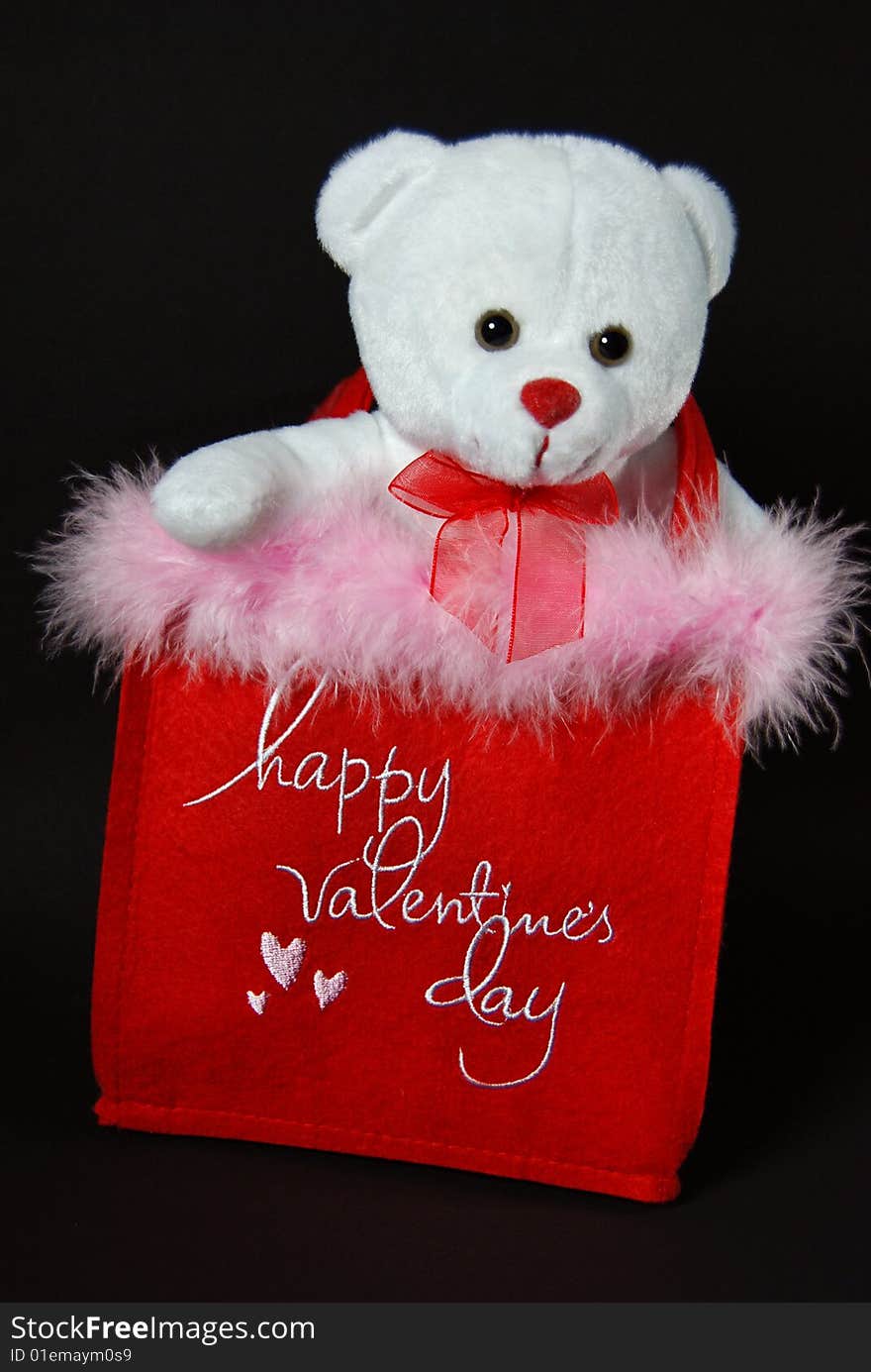 Valentine bear in red bag with trimmed in pink fur. Valentine bear in red bag with trimmed in pink fur.