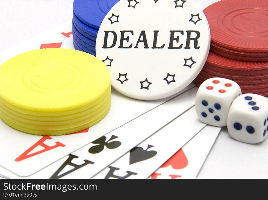 White dealer chip with cards and dice