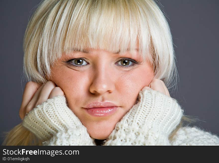 Lovely blond woman with a serious look