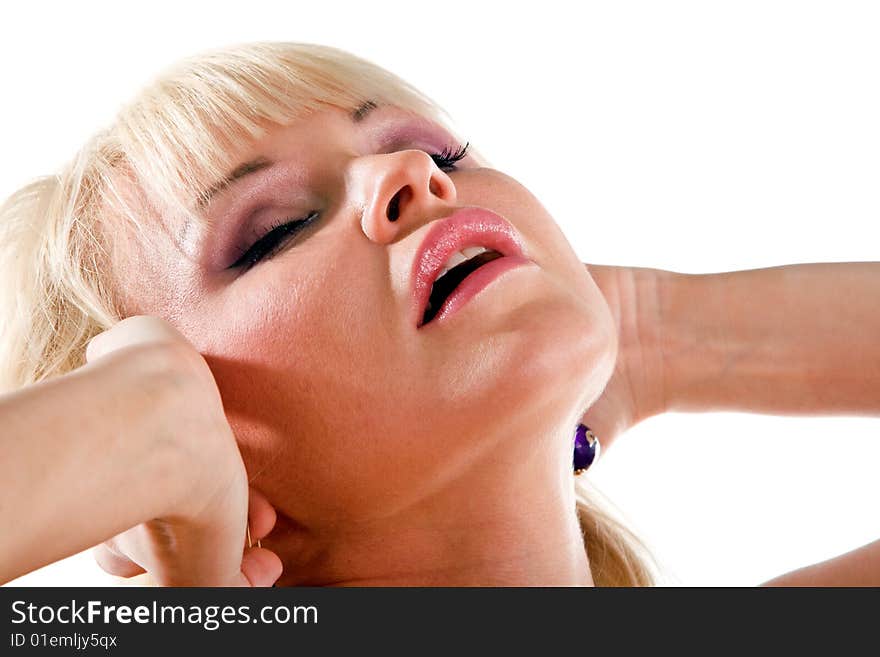 Isolated close up portrait of lovely blond woman with closed eyes