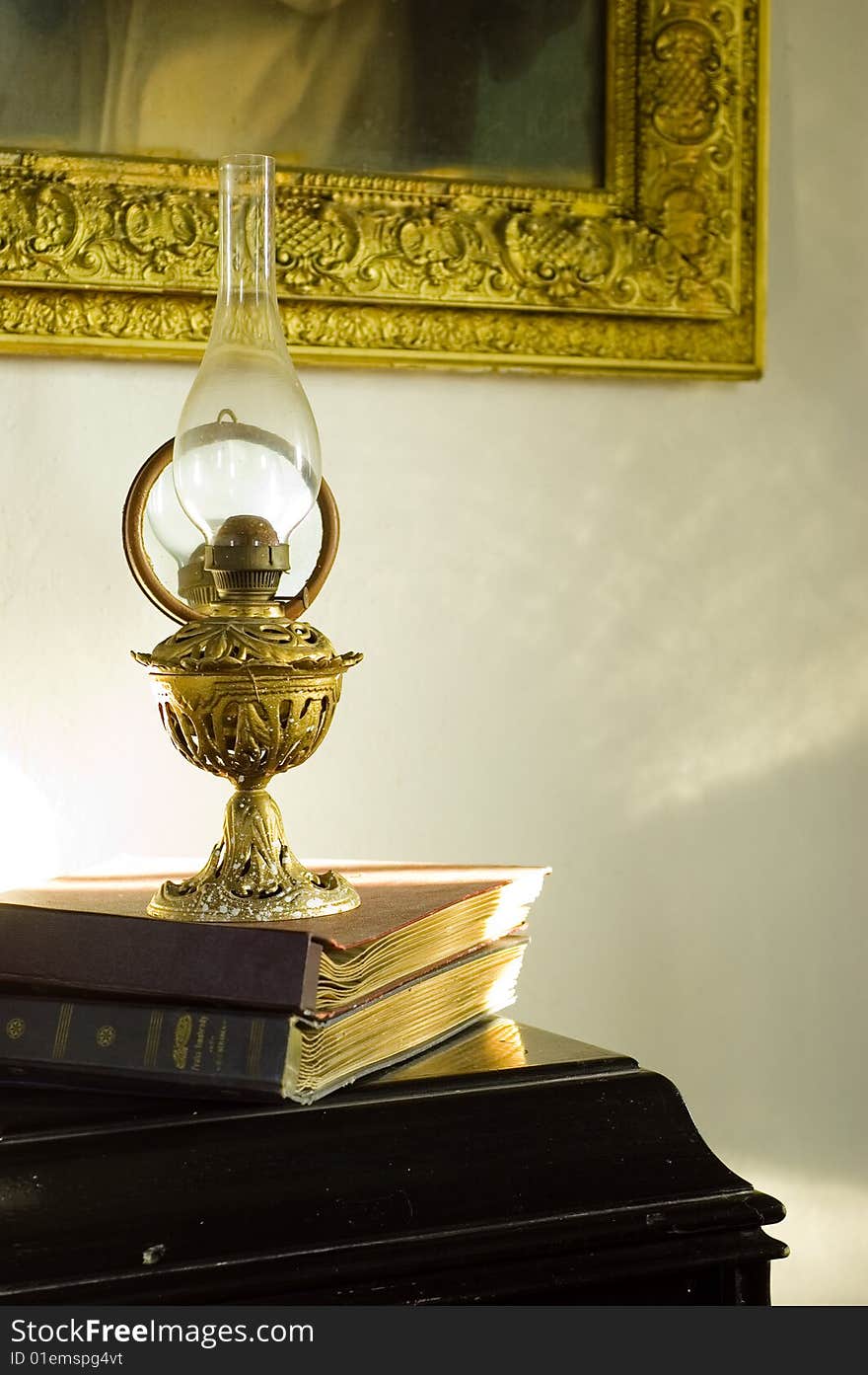 Old things in sunlight, lamp, books, ferniture, picture. Old things in sunlight, lamp, books, ferniture, picture