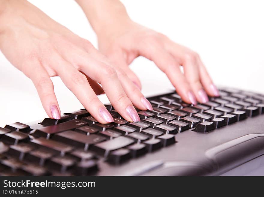 Close-up of woman�s hand touching computer keys during work