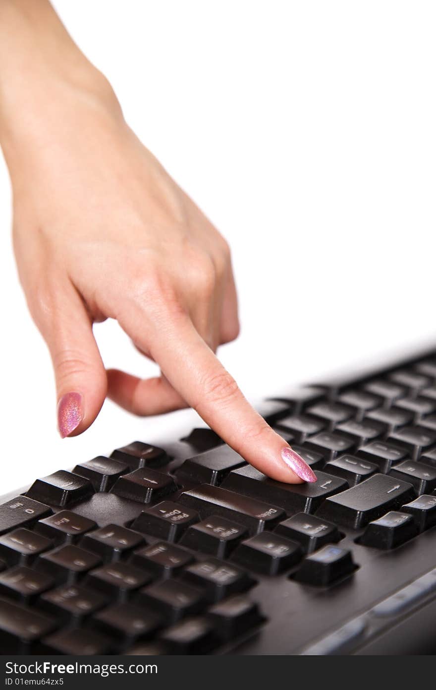 Close-up of woman�s hand touching computer keys during work