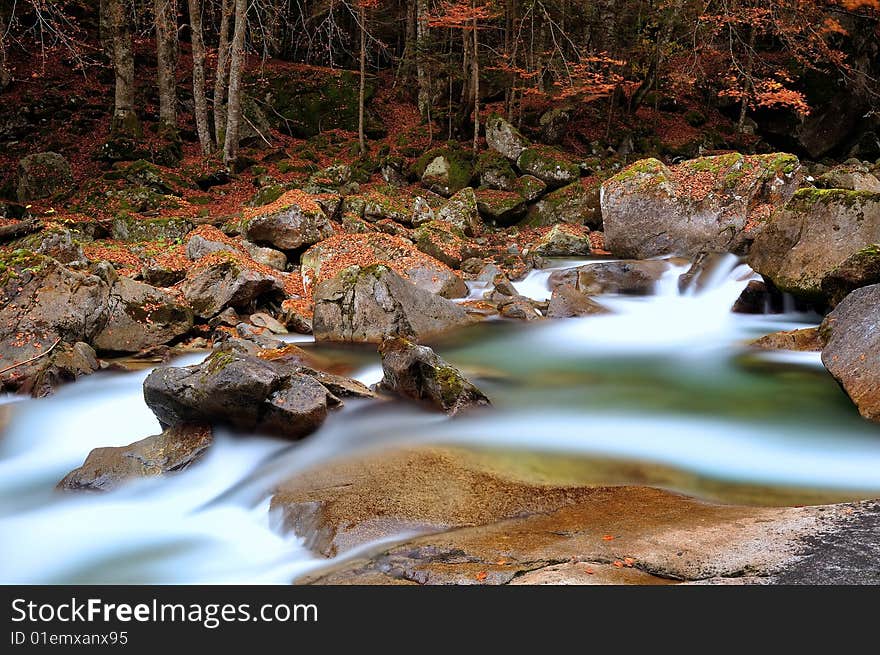 Waterfall in forest in French