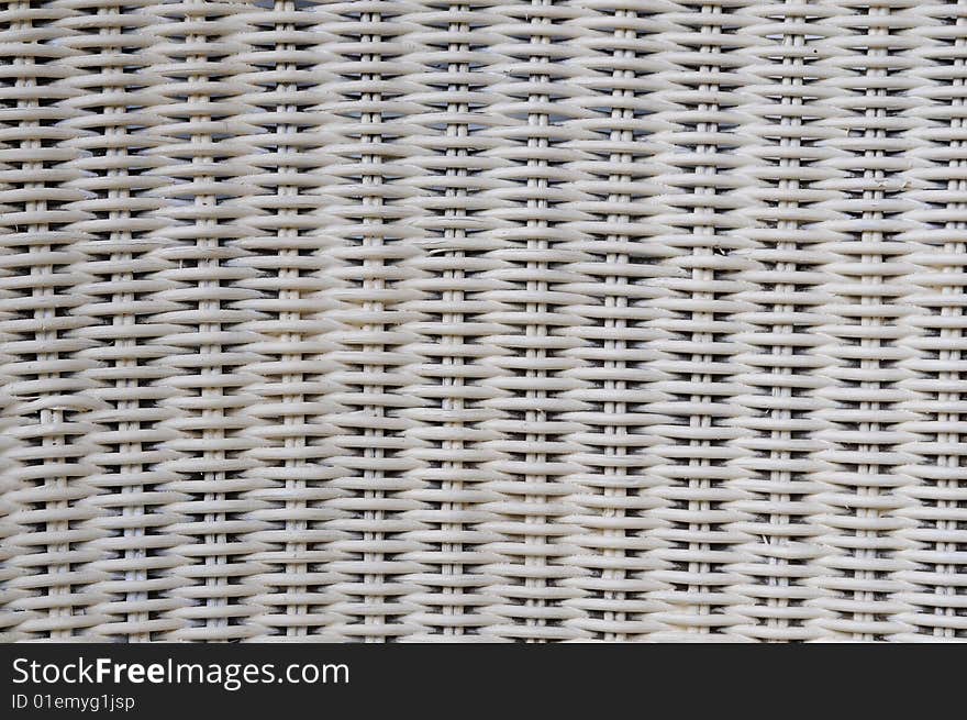 Small part from a wicker chair, grey colored. Small part from a wicker chair, grey colored.