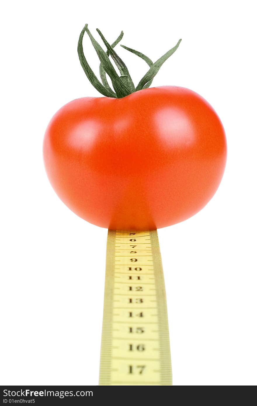 Fresh Tomato with measuring tape on white background