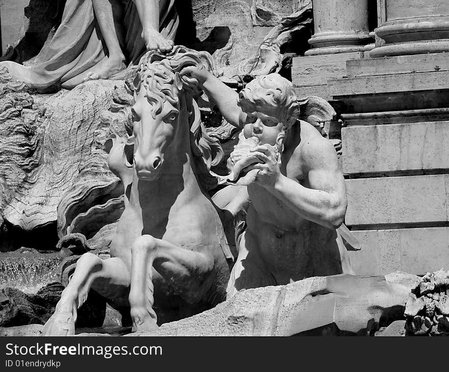 Monochrome of a glimpse of Trevi's fountain in Rome