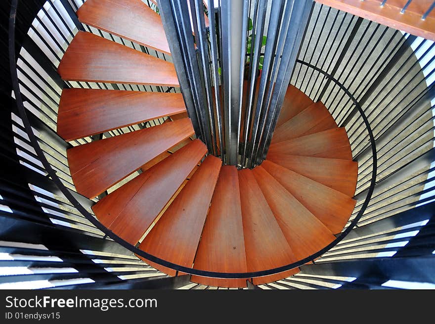 Top view of spiraling wooden stairs. Top view of spiraling wooden stairs