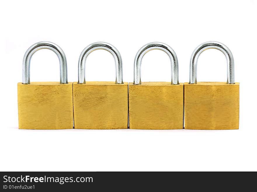 Four golden locks put side by side over white background.