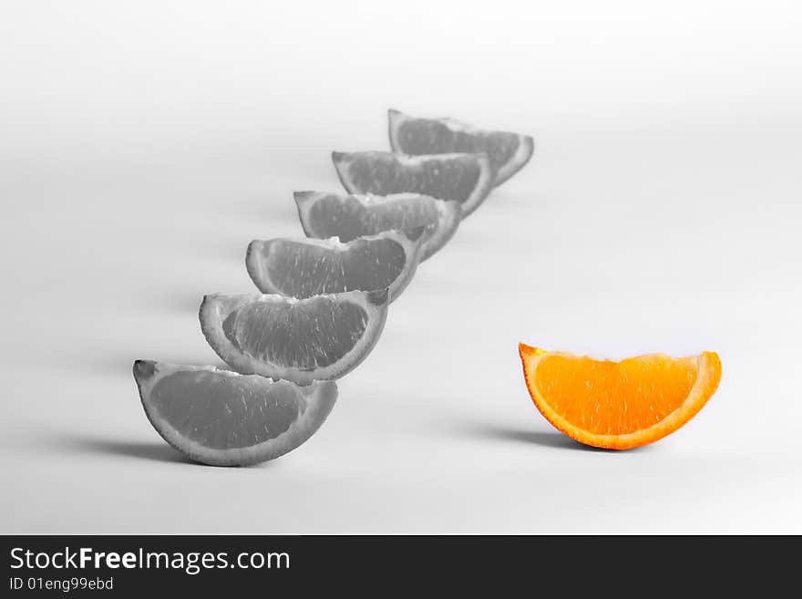 A slice of sweet orange with leadership concept. A slice of sweet orange with leadership concept