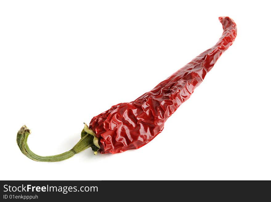 Dried red hot chili pepper isolated on white. Dried red hot chili pepper isolated on white