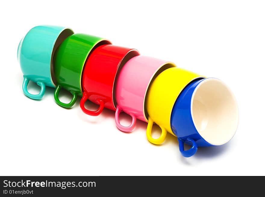 Beautiful color cups on a white background