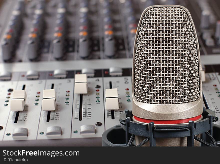 Microphone in sound studio on a white background