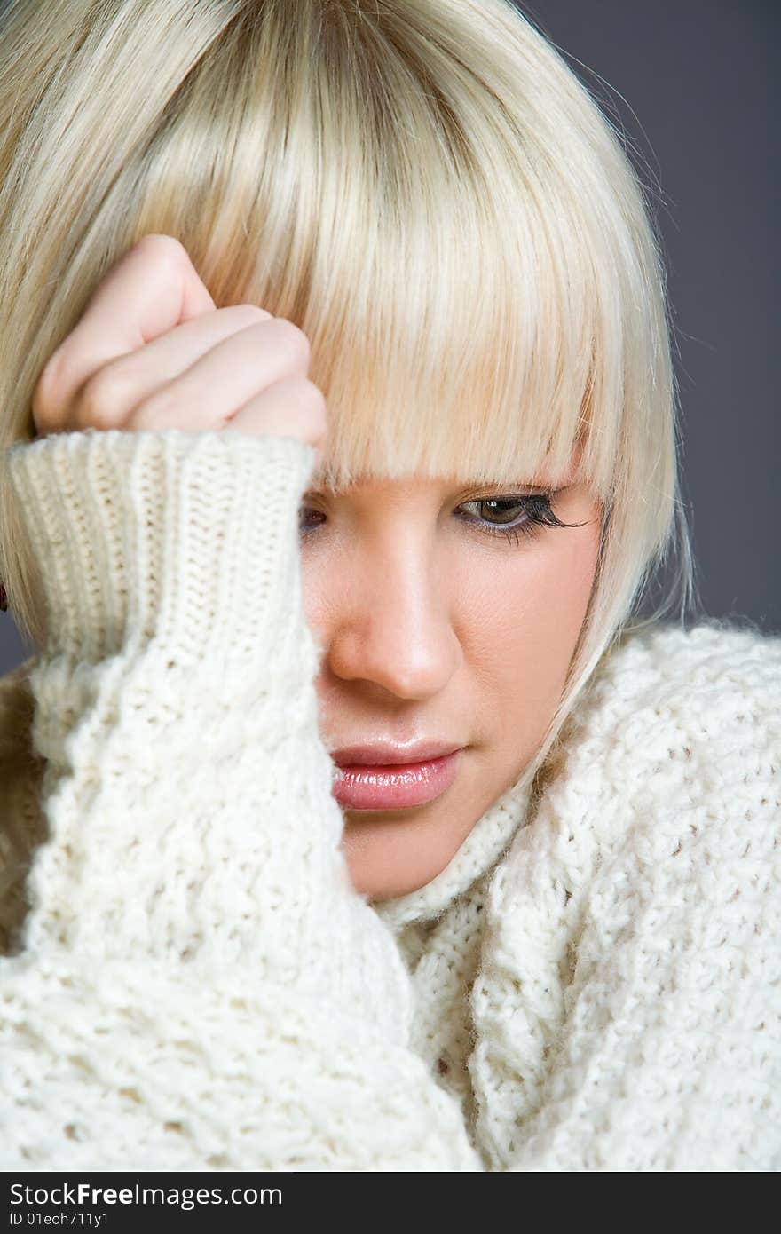 Lovely Blond Woman With A Serious Look