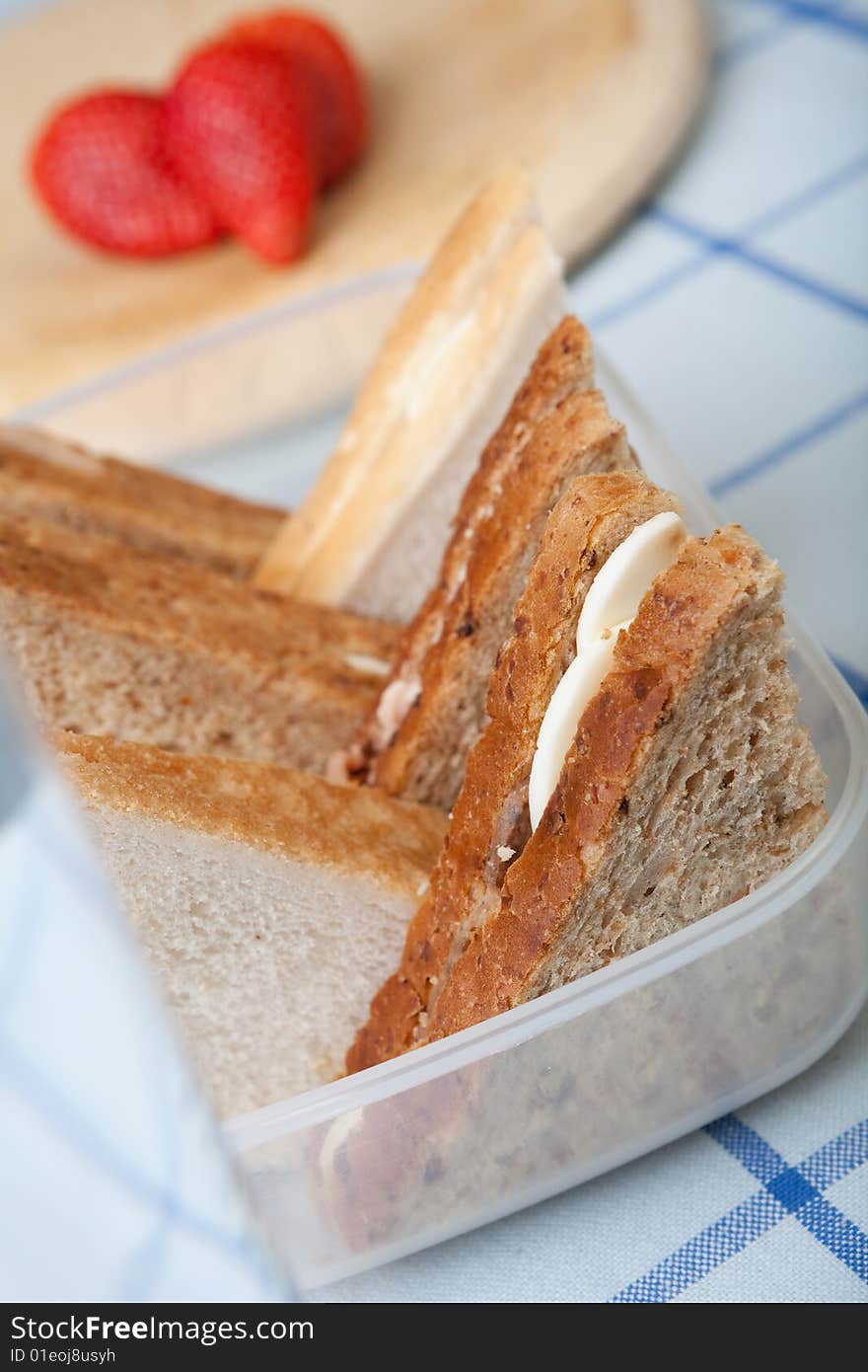 Fresh egg sandwiches in a lunch box