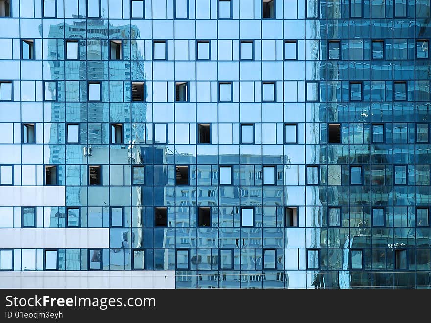 Modern building on the blue sky. Modern building on the blue sky