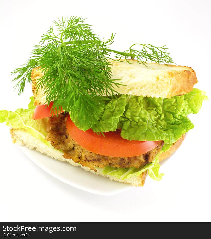 A delicious sandwich with chop lettuce tomato fennel