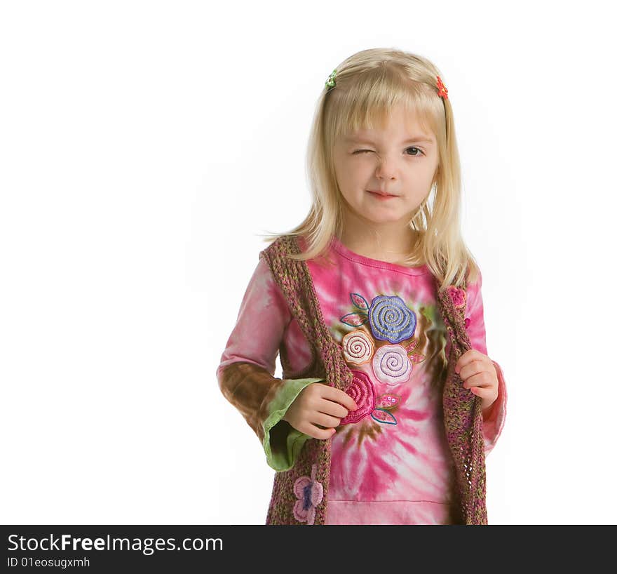 Cute little girl winking on white background.