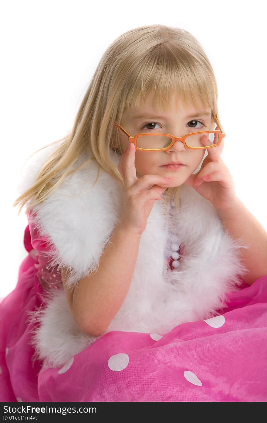 Little girl wearing glasses, white boa, and a pink dress on a white background. Little girl wearing glasses, white boa, and a pink dress on a white background.