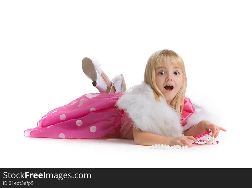 Little girl with a surprised expression, laying on the ground on white background. Little girl with a surprised expression, laying on the ground on white background.