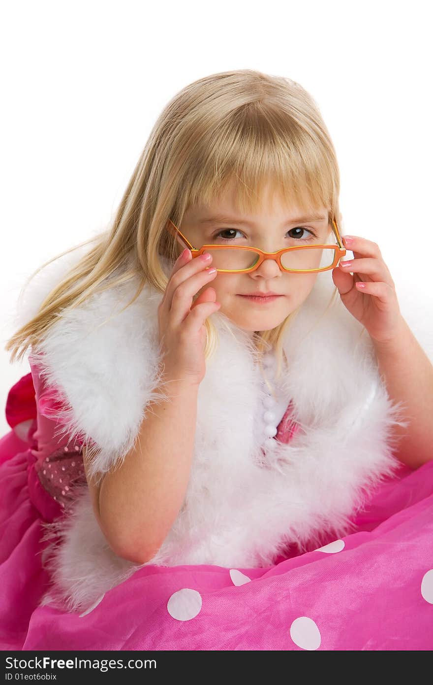 Little girl wearing glasses, white boa, and a pink dress on a white background. Little girl wearing glasses, white boa, and a pink dress on a white background.