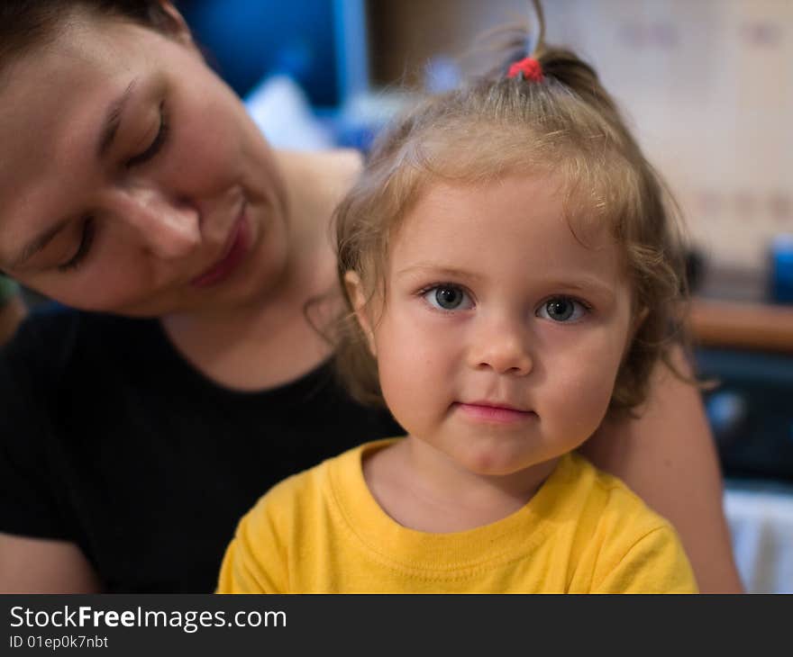 Beautiful little girl on mother's hands. Beautiful little girl on mother's hands