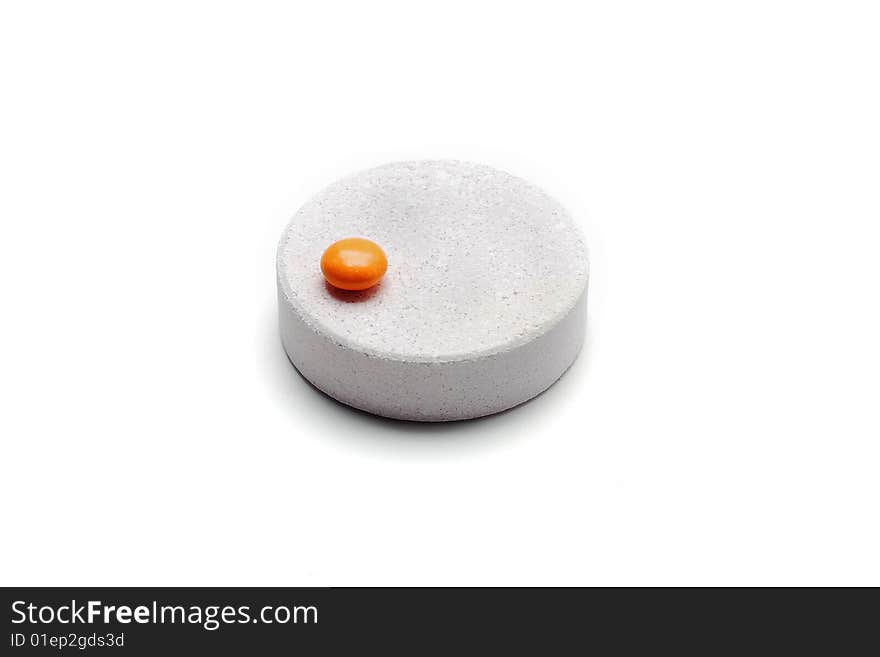 Giant tablet and small pill