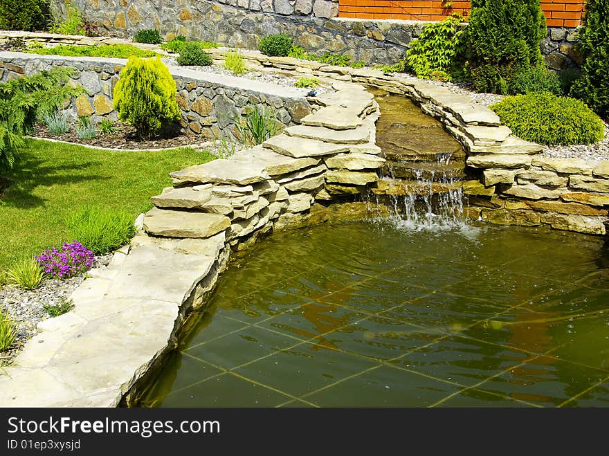 Garden with a lake and waterfall