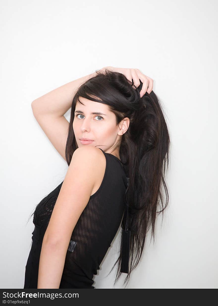 Portrait of attractive brunette girl with long hair