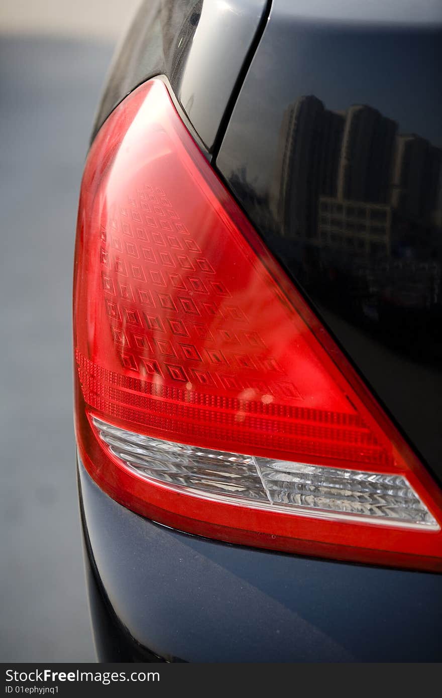 Tail light close up. Tail ligh automobile part. Tail light close up. Tail ligh automobile part.