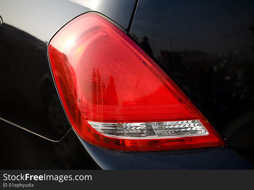 Tail light close up. Tail ligh automobile part. Tail light close up. Tail ligh automobile part.