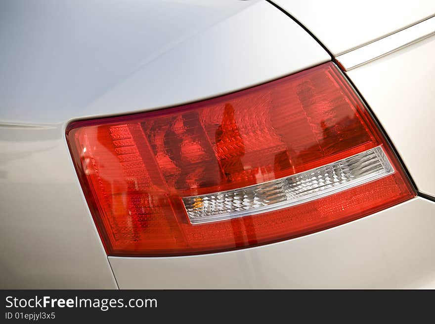 Tail light close up. Tail ligh automobile part. Tail light close up. Tail ligh automobile part.