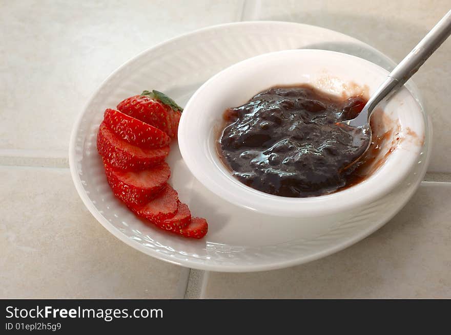 Closeup of strawberry and fruit preserve. Closeup of strawberry and fruit preserve