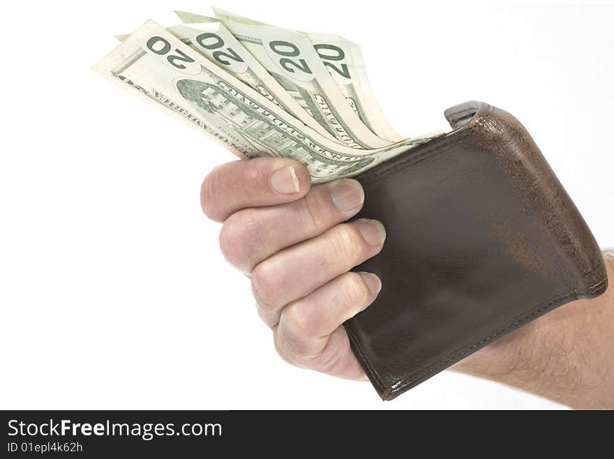 Hand holding wallet with twenty dollar bills