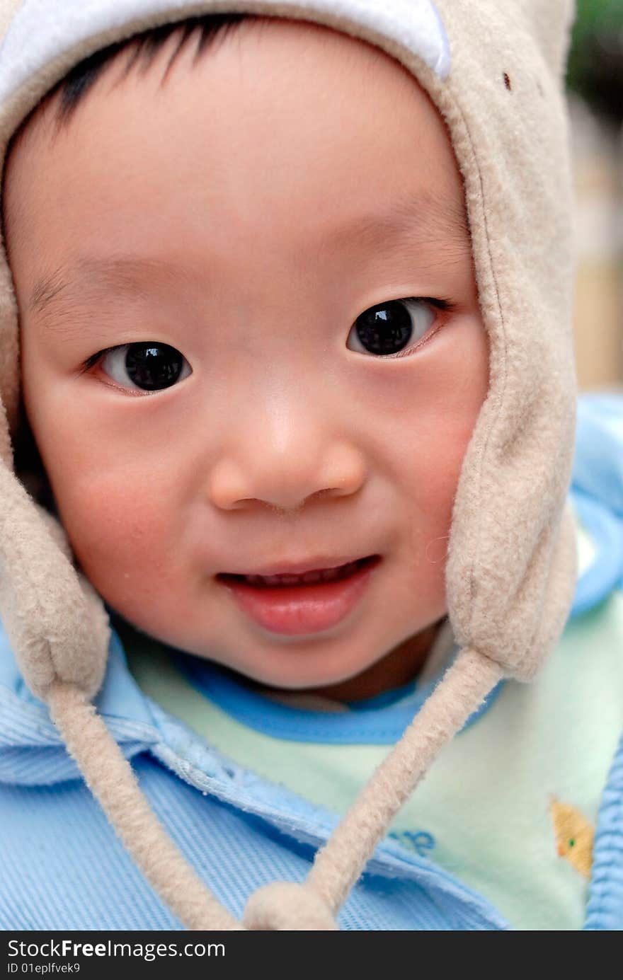 Bright picture of adorable chinese baby boy