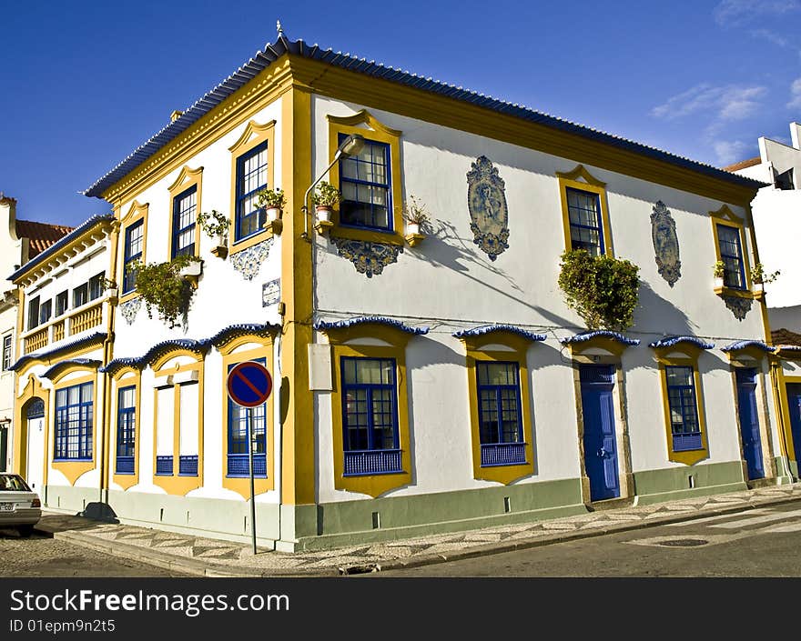 Beautiful house in Aveiro with flowers in the windows