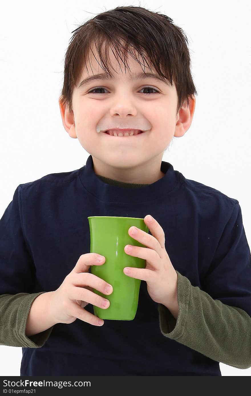 Adorable 5 year old boy with soy milk mustache.