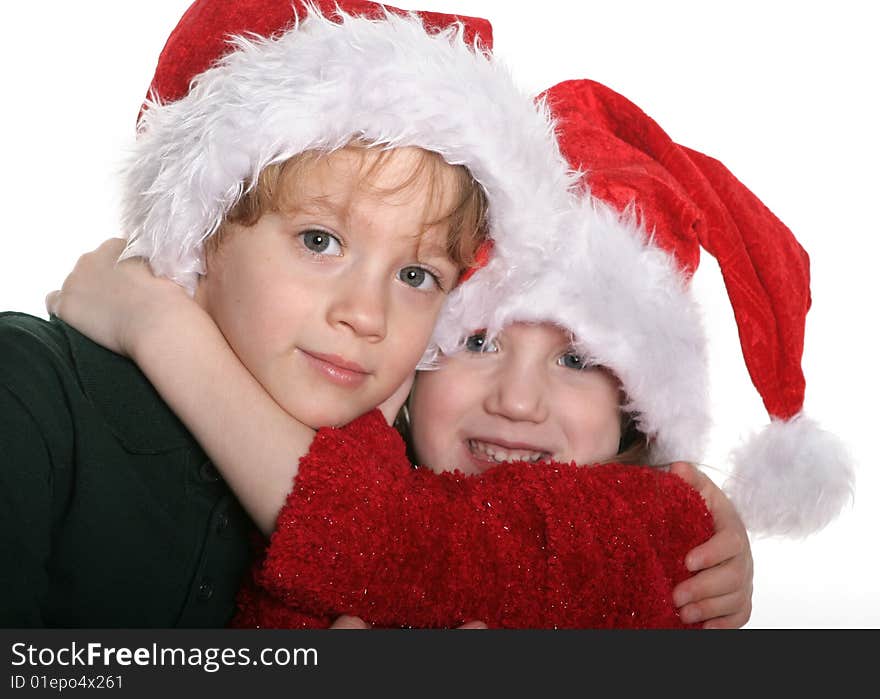 A set of boy girl twins at christmas. A set of boy girl twins at christmas