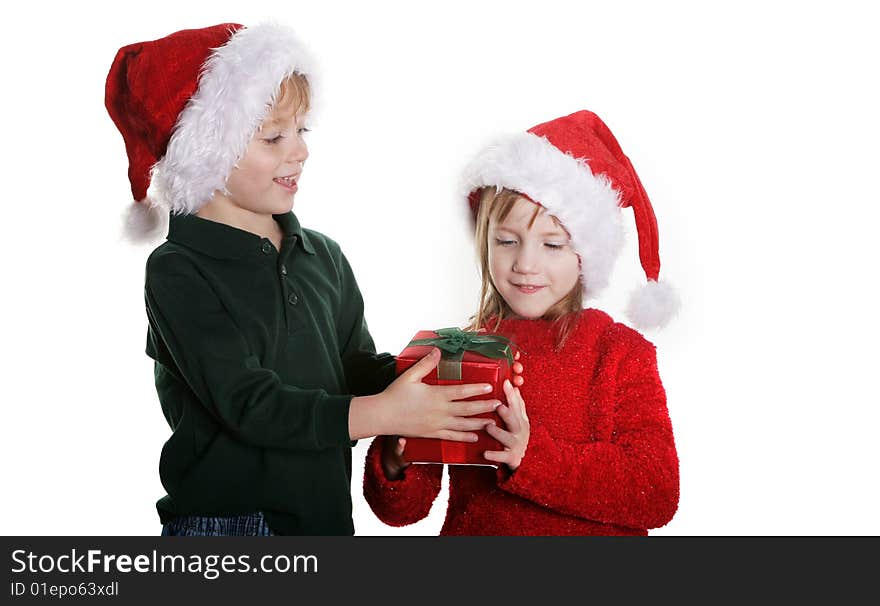 A boy giving a girl a present. A boy giving a girl a present