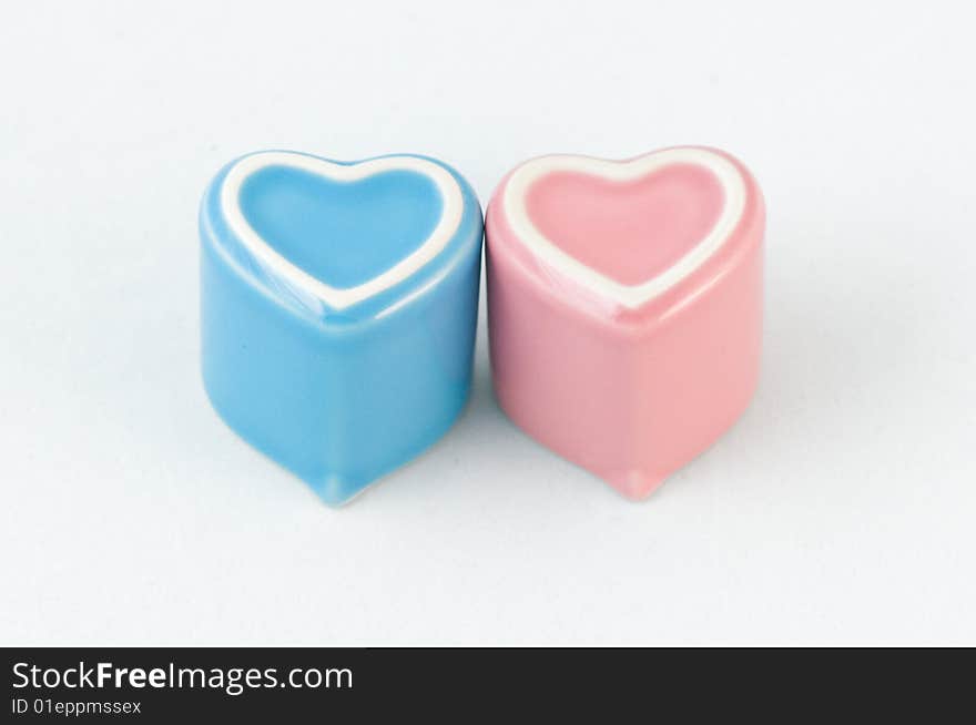 Two Heart-shape Cups On White Background