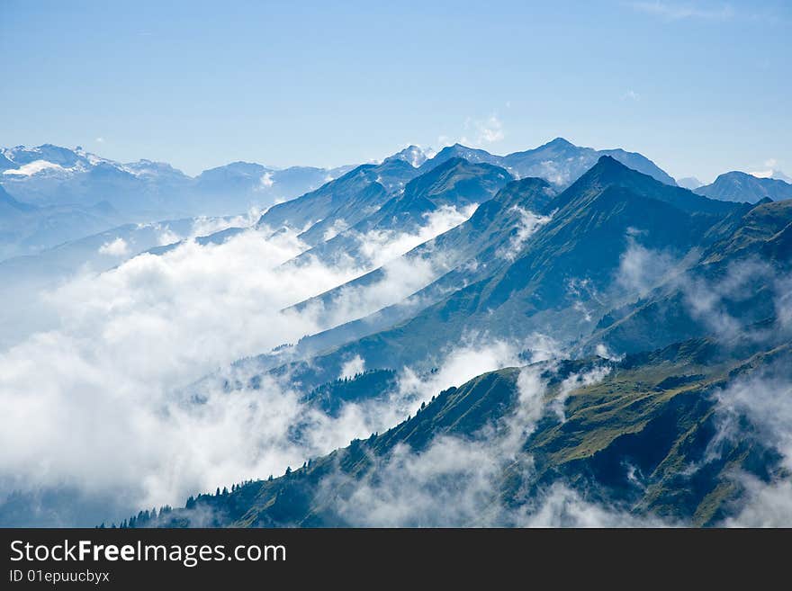 Mountains in the Bernese Oberland with clouds wisp. Mountains in the Bernese Oberland with clouds wisp.