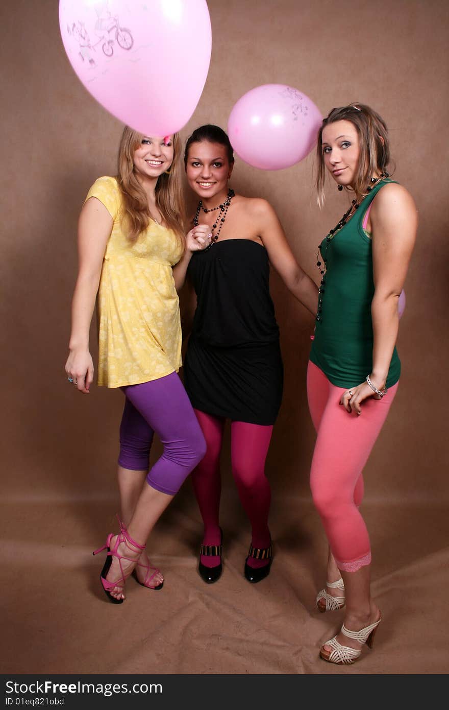 Three girls with balloons in studio. Three girls with balloons in studio