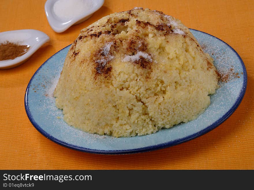 Wheat grit with cinnamon and sugar on plate