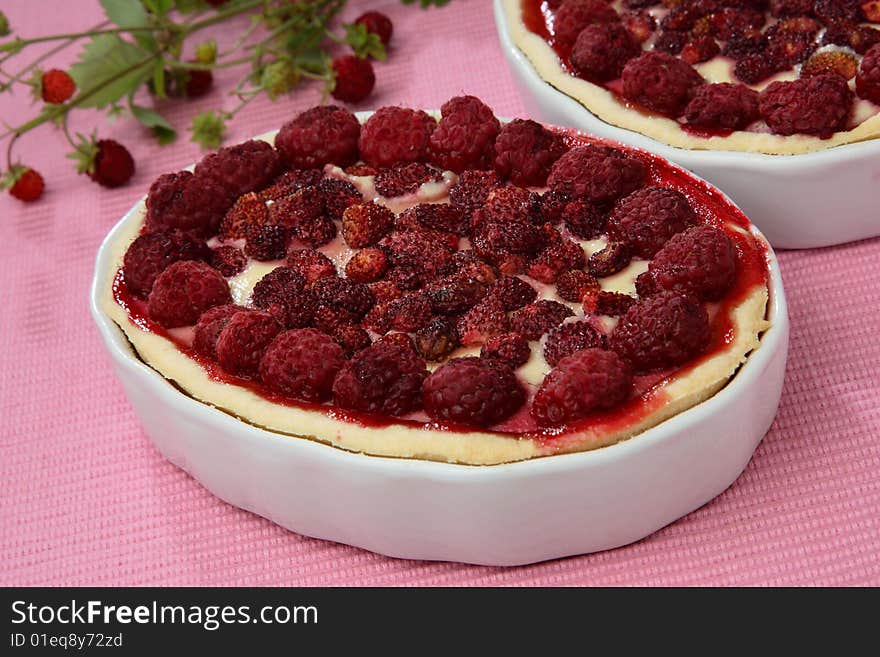 Three wood strawberry muffins on plate