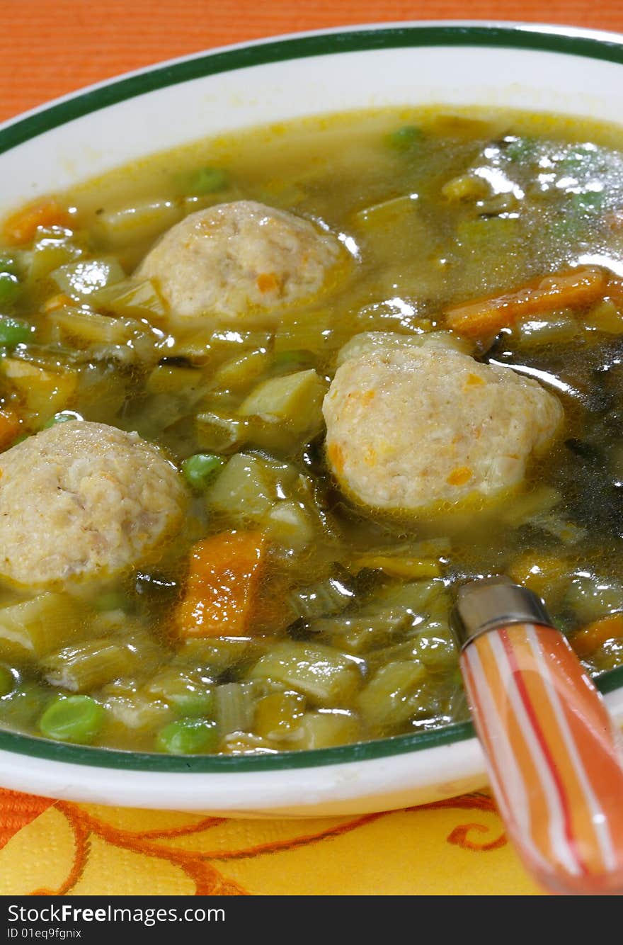 Vegetable soup with meat on plate