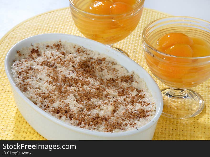 Dessert and apricot compote on plate