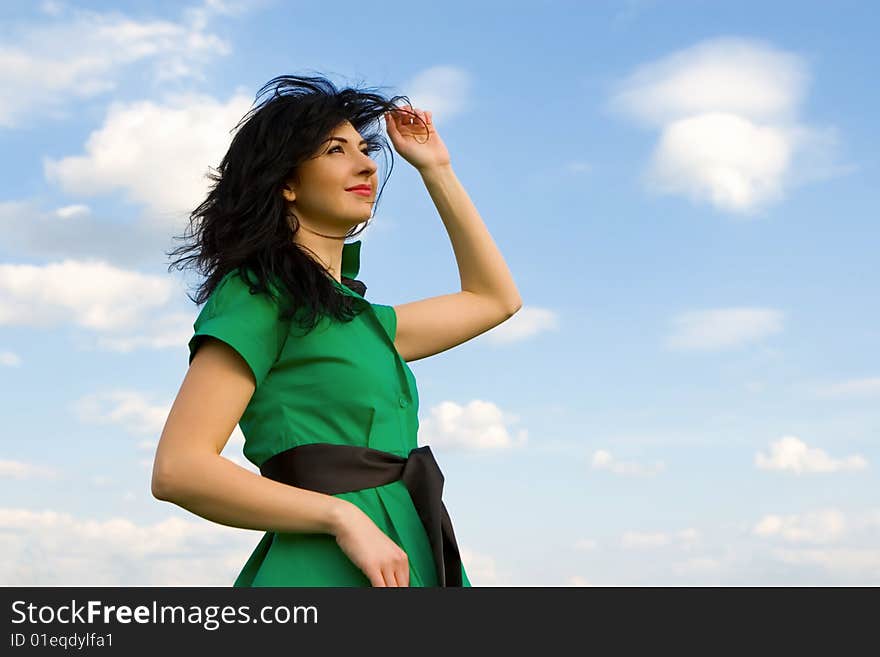 Pretty woman in sky background